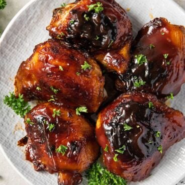 bbq baked chicken thighs image created for social media