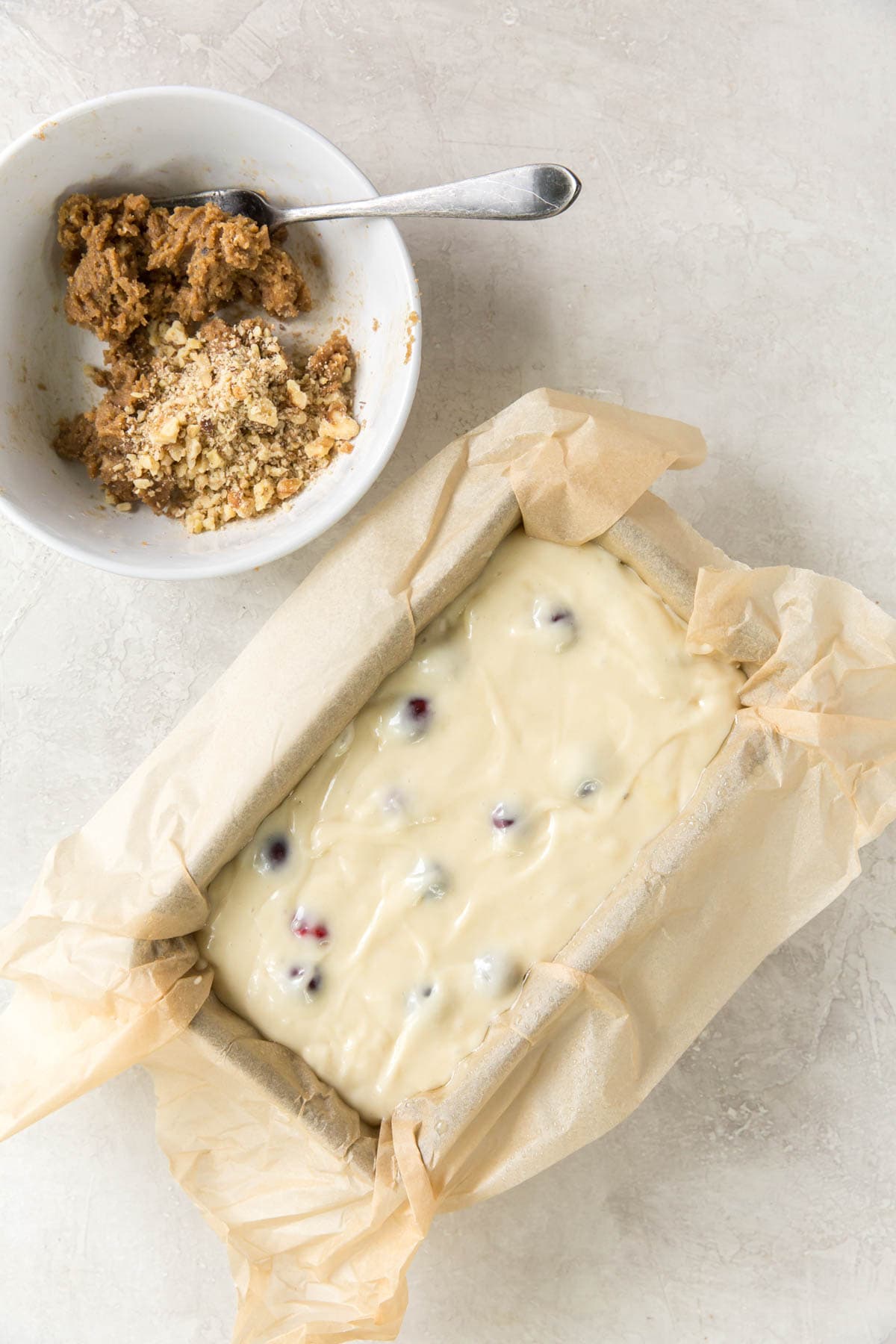 Cranberry bread batter in a loaf pann.