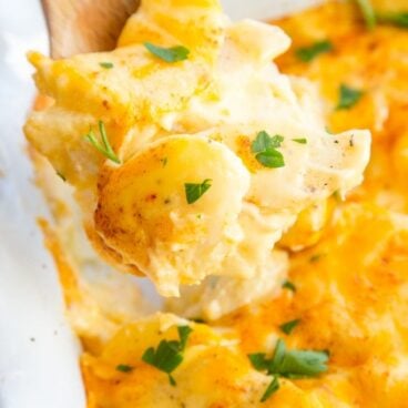 A close up of cheesy scalloped potatoes