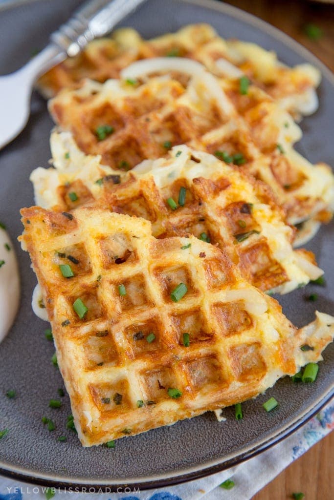These easy, cheesy hash brown waffles are just the hack you need to simplify your breakfast routine! Who doesn't love a quick and easy breakfast?