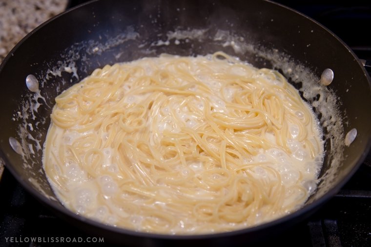 One Pan Garlic Parmesan Pasta cooking in a large skillet