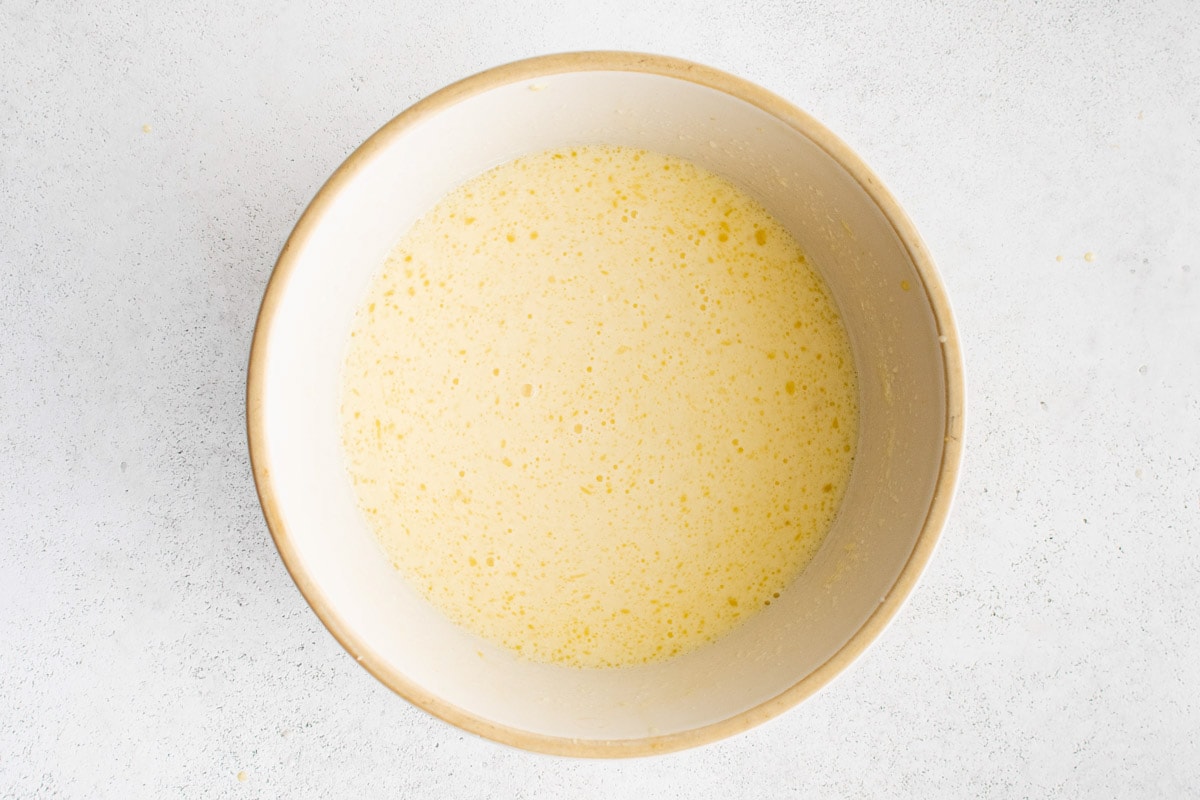 Creamy white mixture in a mixing bowl.