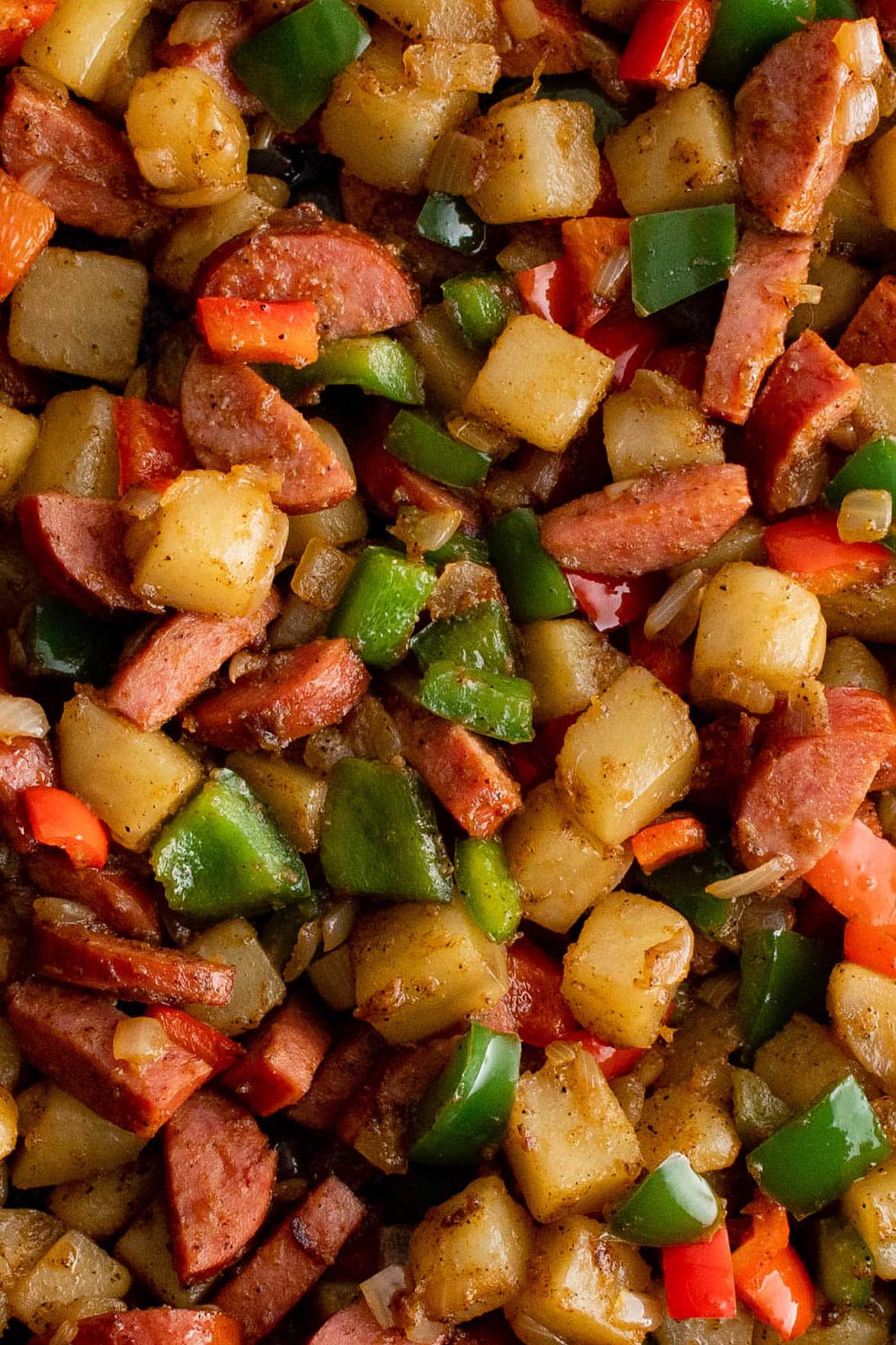 Close up of potato and sausage hash. 
